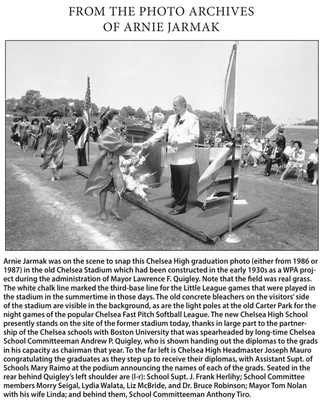 Retrospective archive panel with an Arnie Jarmak photograph of Andrew P. Quigley presenting a diploma at Chelsea High School graduation in the old Chelsea Stadium.