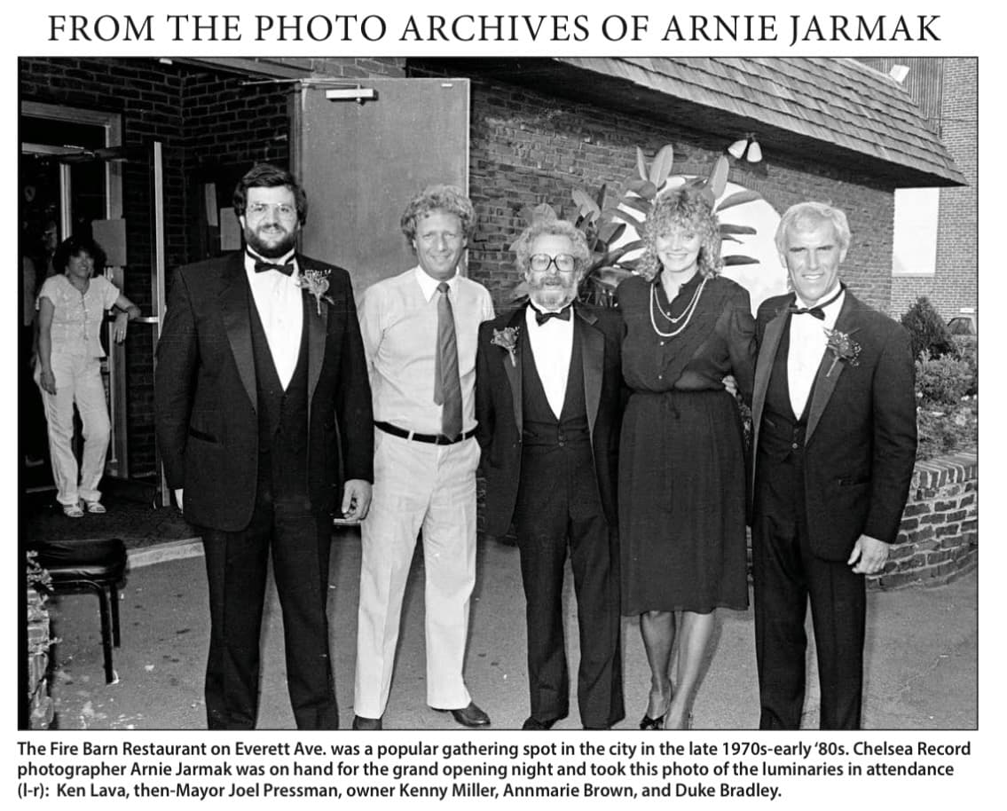 Retrospective archive panel with an Arnie Jarmak group photograph from opening night at the Fire Barn Restaurant on Everett Avenue in Chelsea.
