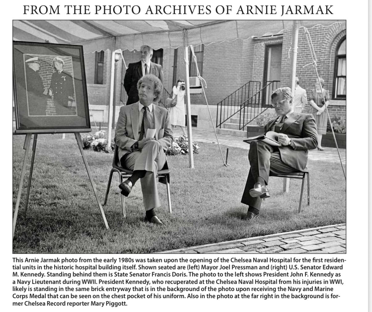 Retrospective archive panel with an Arnie Jarmak photograph of Mayor Joel Pressman and Senator Edward Kennedy at the opening of residences in the Chelsea Naval Hospital building.