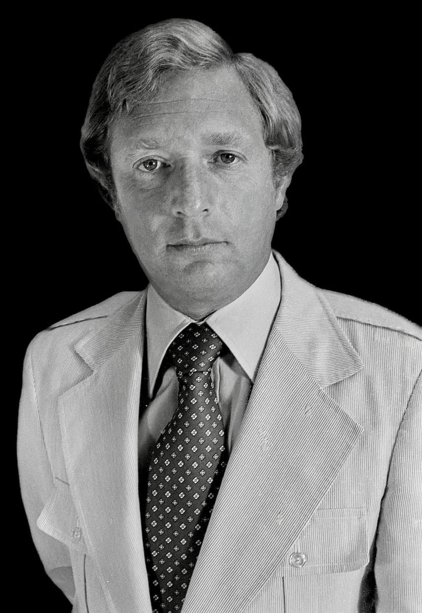 Black-and-white formal portrait of Mayor Joel M. Pressman in a suit and tie.