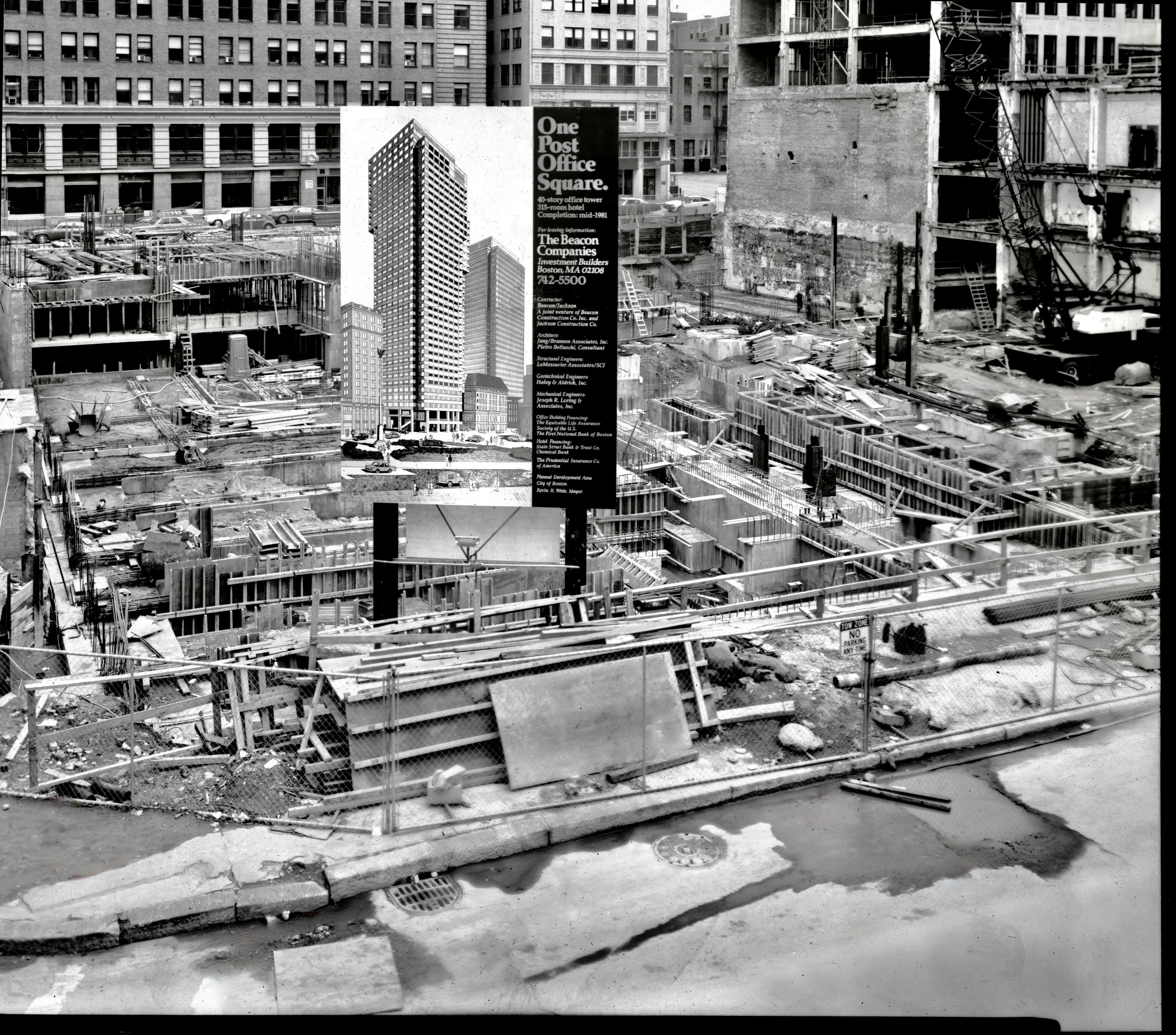 Black-and-white photograph of the One Post Office Square construction site, with a project sign, concrete foundations, and surrounding buildings.